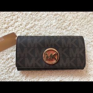 NWT Michael Kors Signature PVC Fulton Flap Wallet